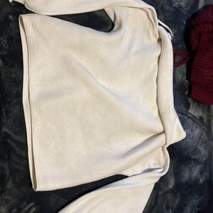White off the should sweater